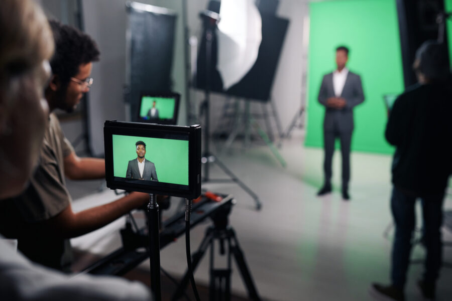 Videomaker shooting journalist for broadcast